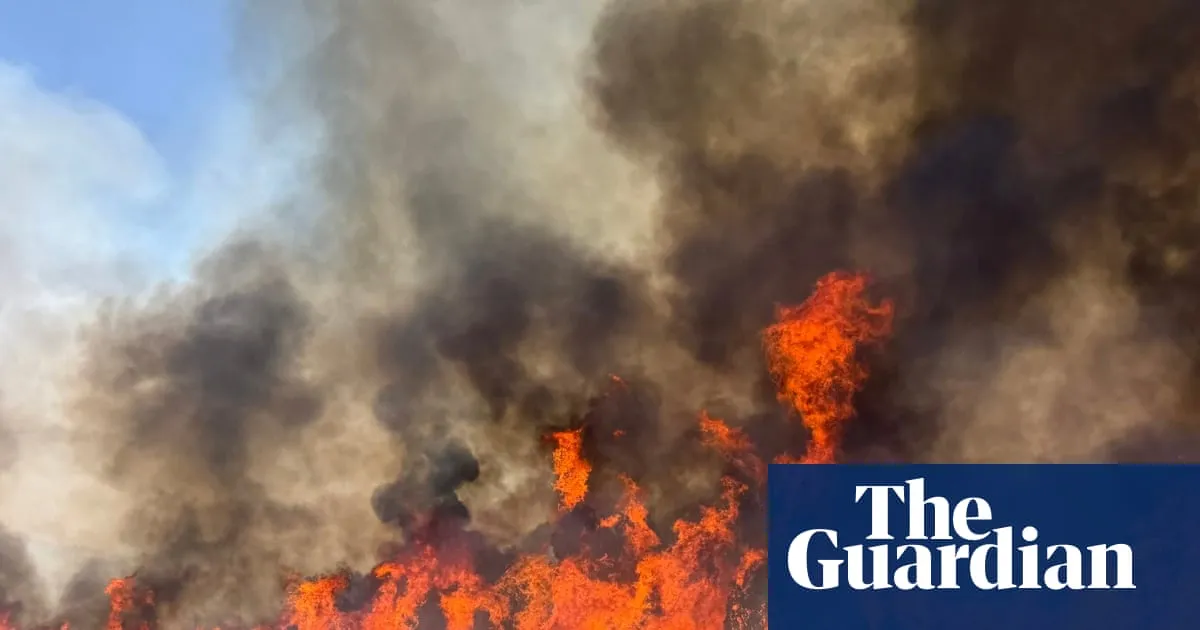 Helicopter fighting Utah wildfire crashes with two people onboard, officials say