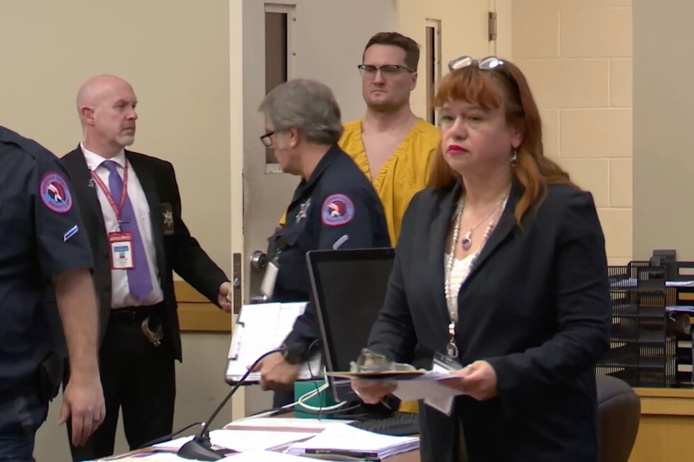 Illinois surgeon pleads not guilty to the killings of his ex-wife and her dentist husband in Ohio