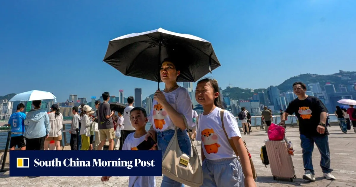 Hong Kong breaks record for hottest day as Typhoon Dolphin brings extreme heat