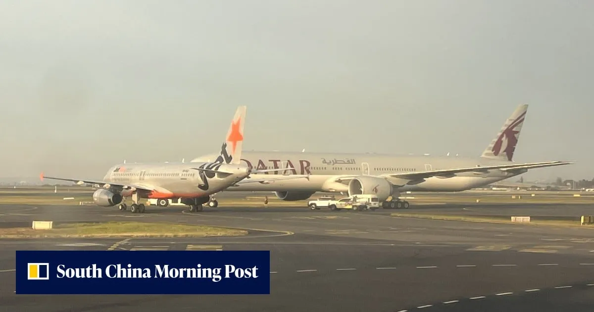 Jetstar plane narrowly avoids crashing into Qatar Airways flight at Sydney airport