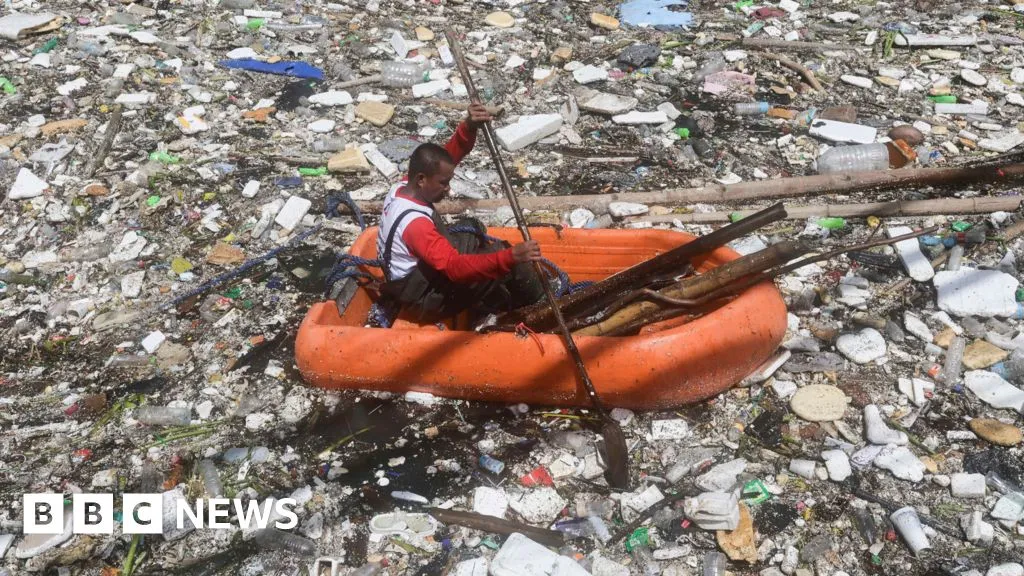Watch: Tide of rubbish blankets Philippines river