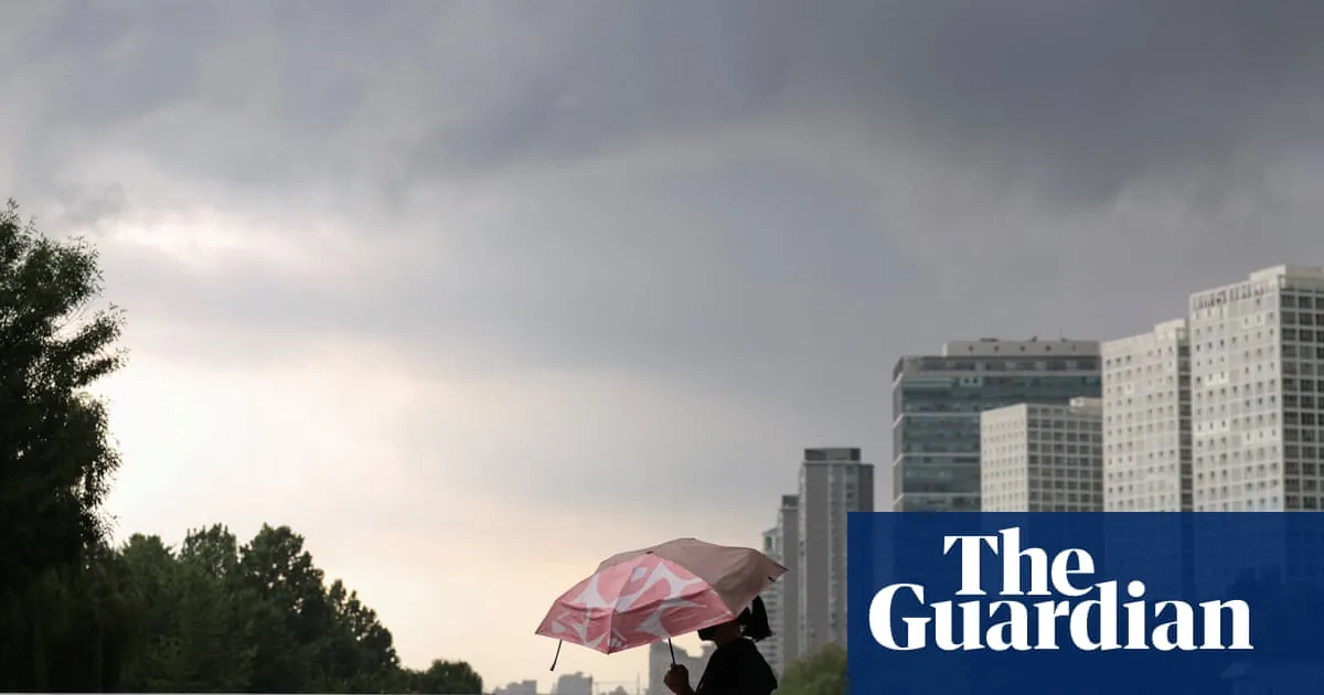Mass evacuations in Beijing as Typhoon Dolphin brings more torrential rain to China