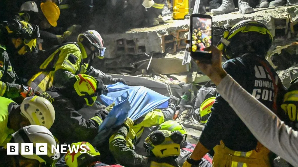 Woman pulled alive from rubble 36 hours after Colombia quake