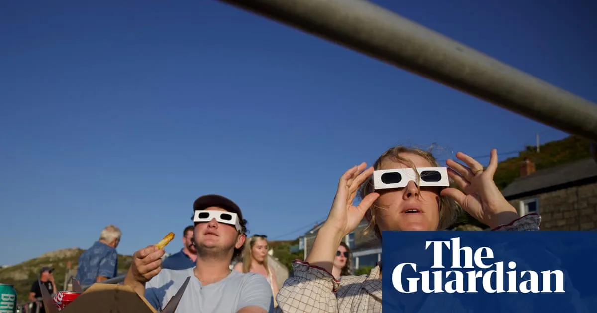 ‘A magical eeriness’: Cornwall comes together for communal moment during solar eclipse