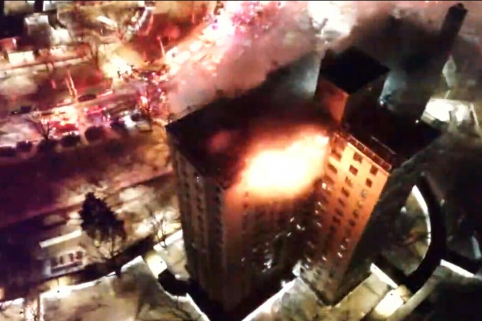 Firefighters battle blaze on top floors of Bronx apartment