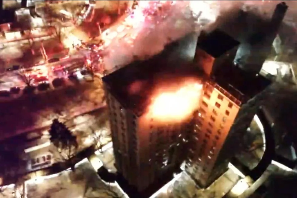 Firefighters battle blaze on top floors of Bronx apartment