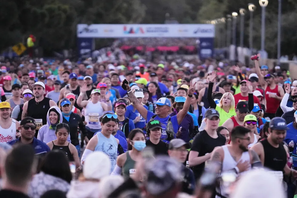 The warming climate is forcing marathons to consider changes to keep runners cool