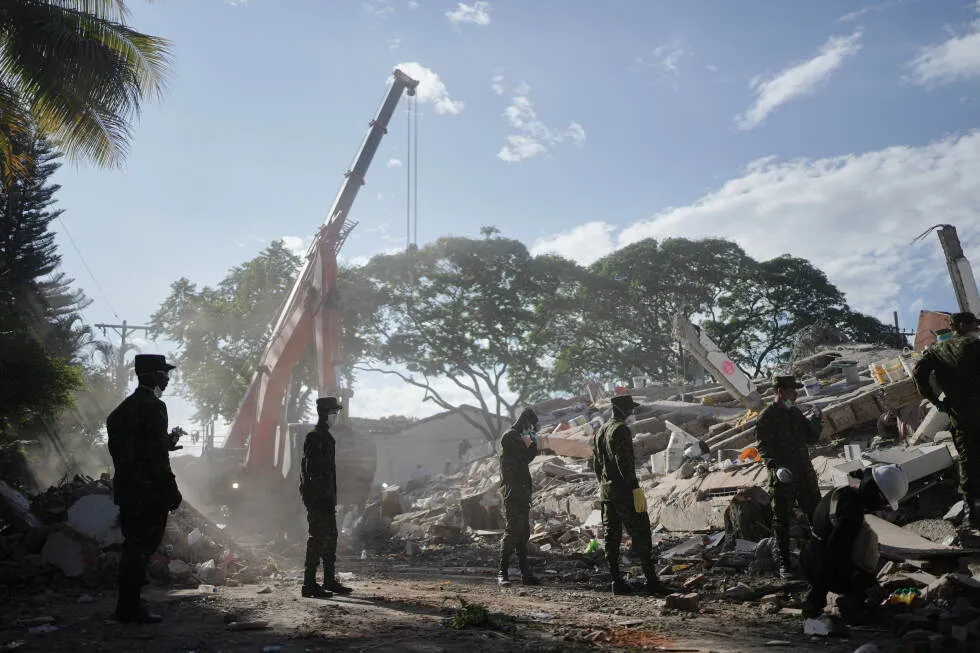 Rescuers call for silence around earthquake rubble as window for survival narrows in Colombia