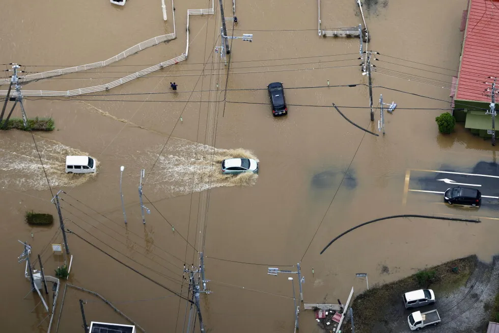 Heavy rain causes flooding near Tokyo that kills 4 and disrupts train and air travel