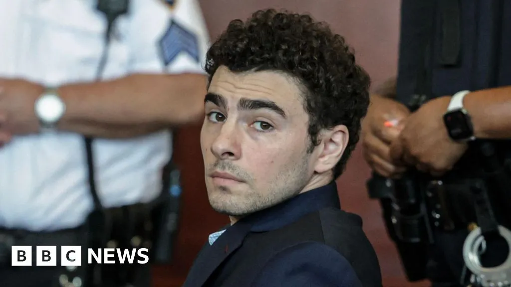 Mangione admits killing healthcare CEO and pleads guilty to federal charges