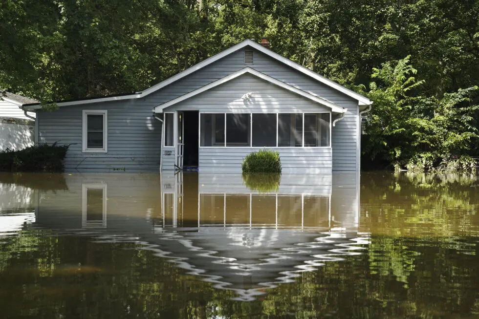 At least 6 people have died from days of storms and record-setting flooding in Indiana