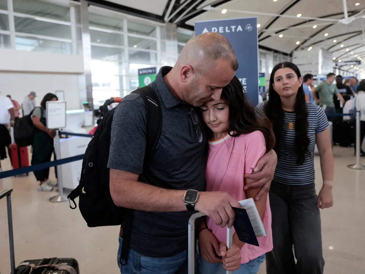 Palestinian-American travels to West Bank home encircled by Israeli settler