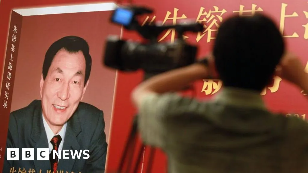 China censors public mourning as it holds former premier's funeral