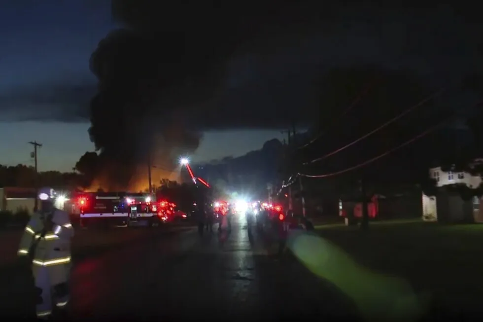 Ohio firefighters responding to explosions and a fire at Toledo industrial recycling business