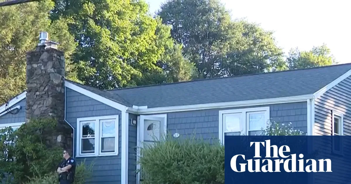 Arrest warrant issued for wife of Massachusetts officer found dead at home