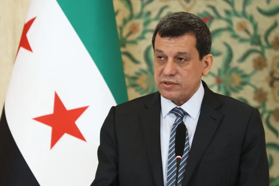 Kurdish-led group in Syria says it has dissolved after merging with the army