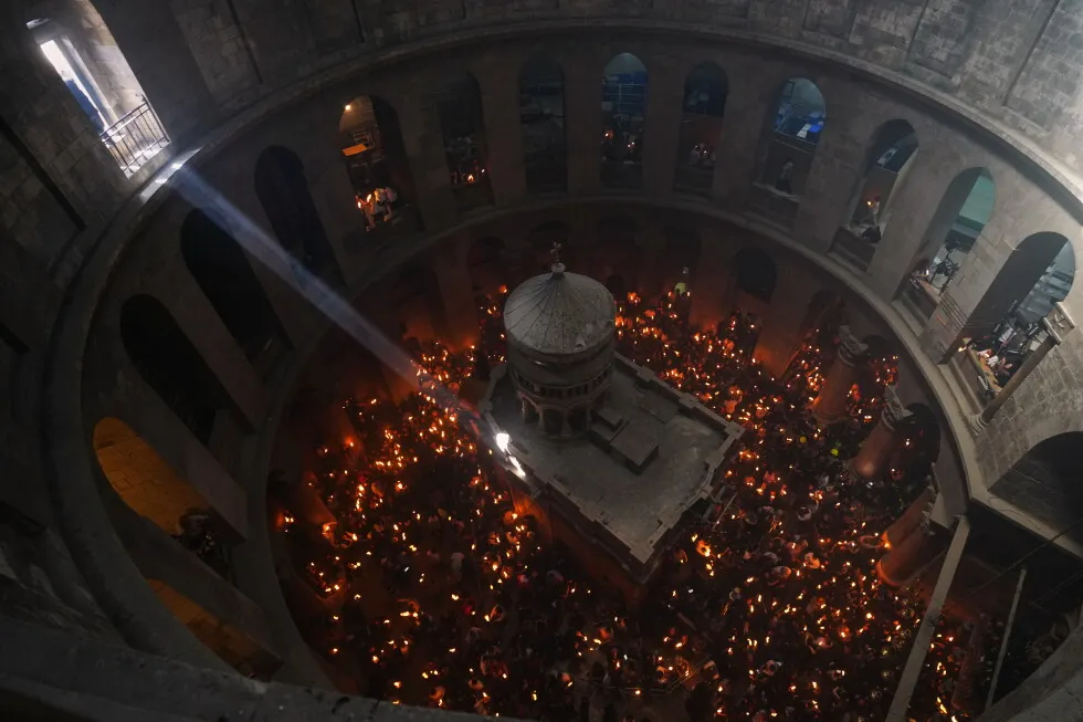 An AP reporter spends the night locked inside Jerusalem’s holiest church with clergy and pilgrims