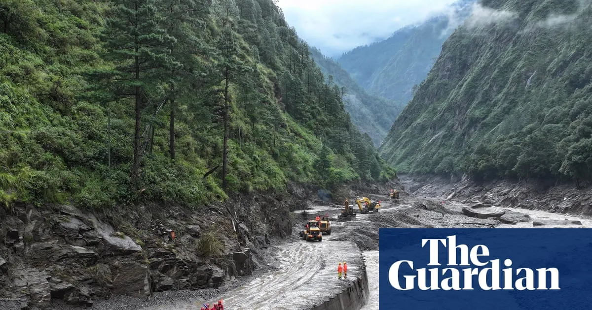 Flood risk forces halt to rescues in Tibet, as Nepal death toll rises to 469