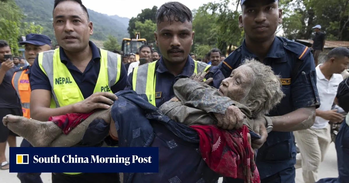 China-Nepal floods: rescuers pull out survivors caked in mud as toll climbs