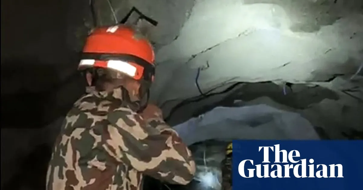 Nepal rescuers race to reach hundreds feared trapped in hydropower tunnels