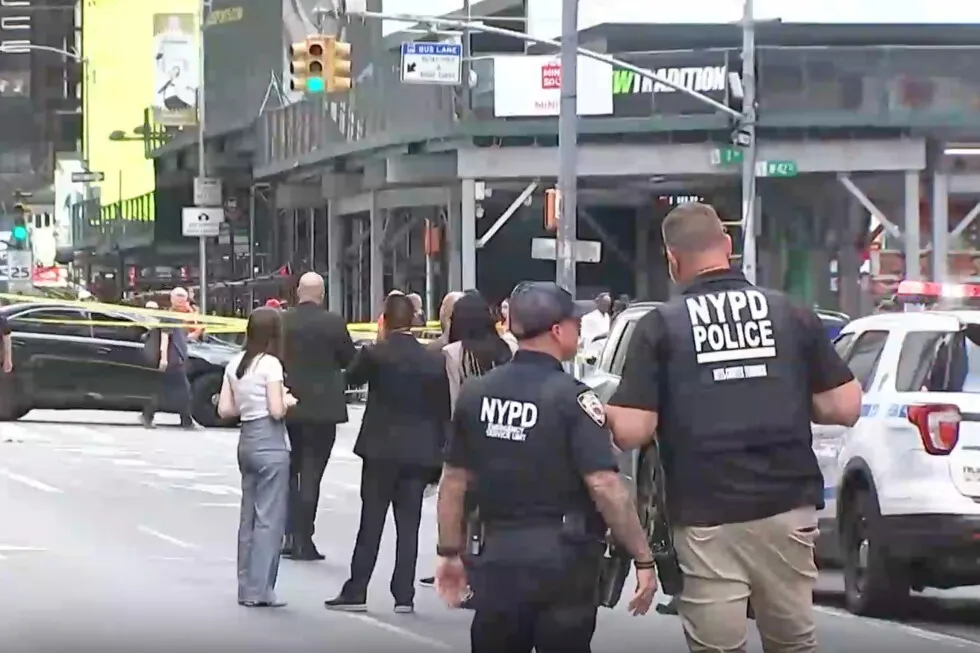 A woman stabs 2 people and is shot by police in Times Square