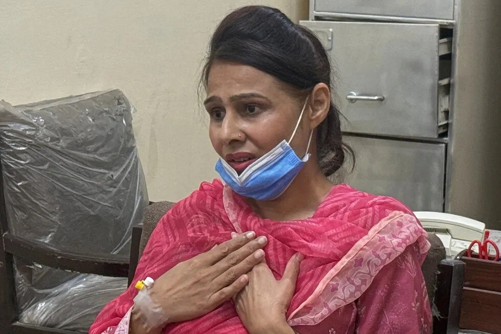 AP Exclusive: Nurse who saved baby from Pakistan hospital fire wishes she could have saved the rest