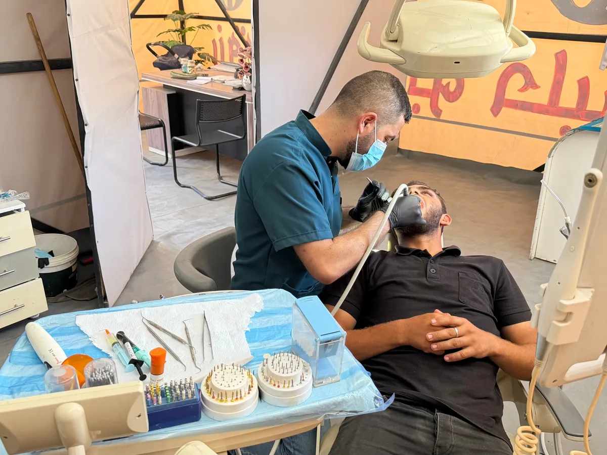 Israel’s siege on Gaza is forcing dentists to operate in the streets