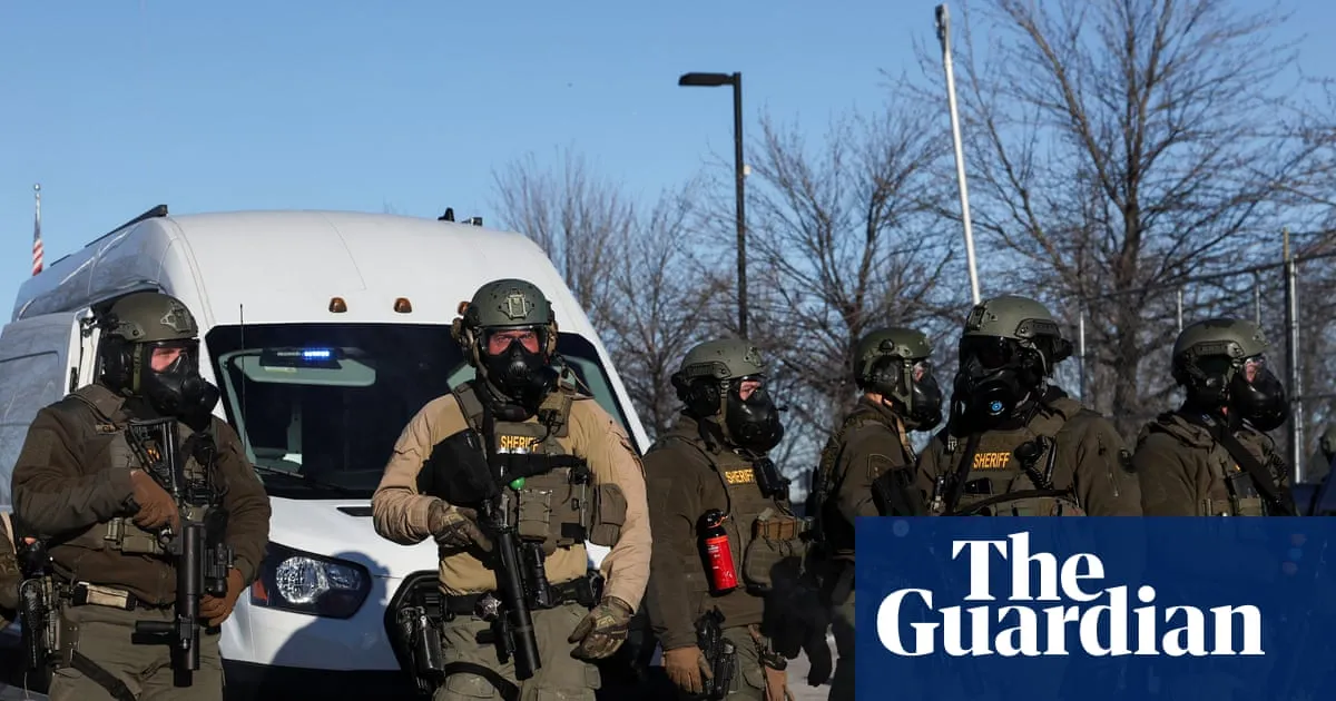 ICE officer who shot Venezuelan man in Minneapolis charged with lying to investigators