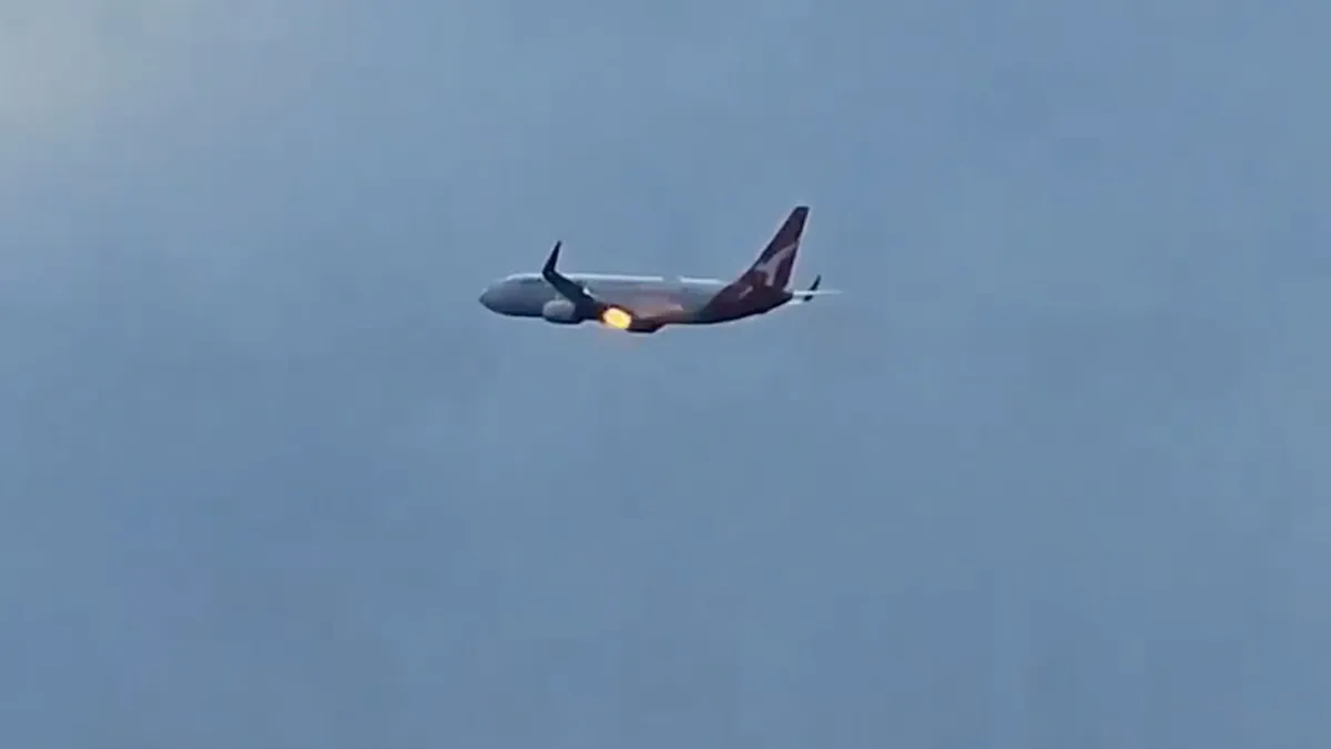 Flames burst from Qantas plane engine after New Zealand takeoff