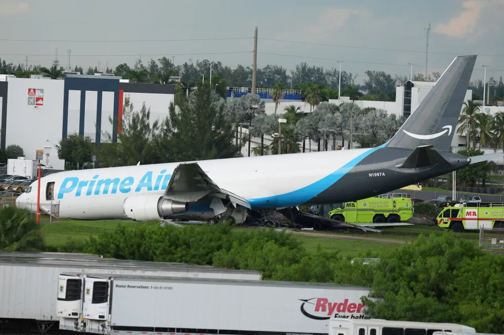 Amazon cargo plane sends up billowing cloud of smoke after overrunning runway at Miami airport