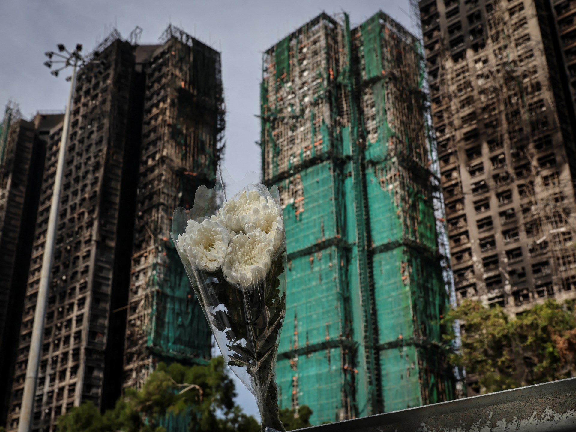 As Hong Kong reckons with worst fire in decades, many see echoes of 2019
