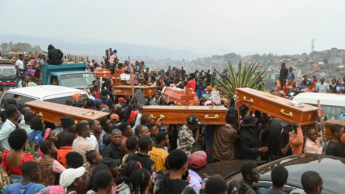 Funerals for children killed after fire spreads to school in DR Congo
