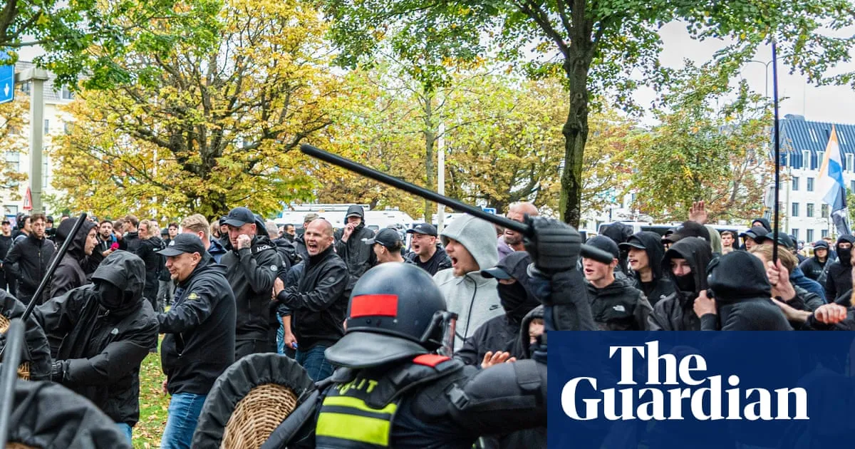 Dutch riot police break up violent far-right protest in The Hague