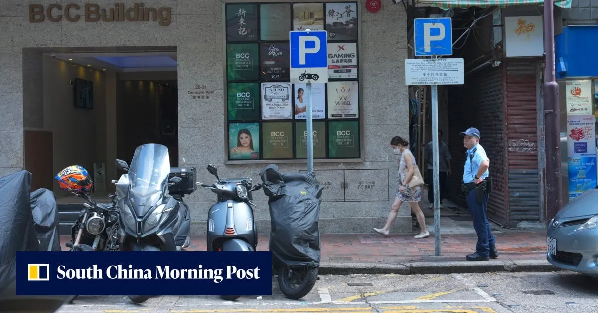 Hong Kong police search for woman after man found dead outside commercial building