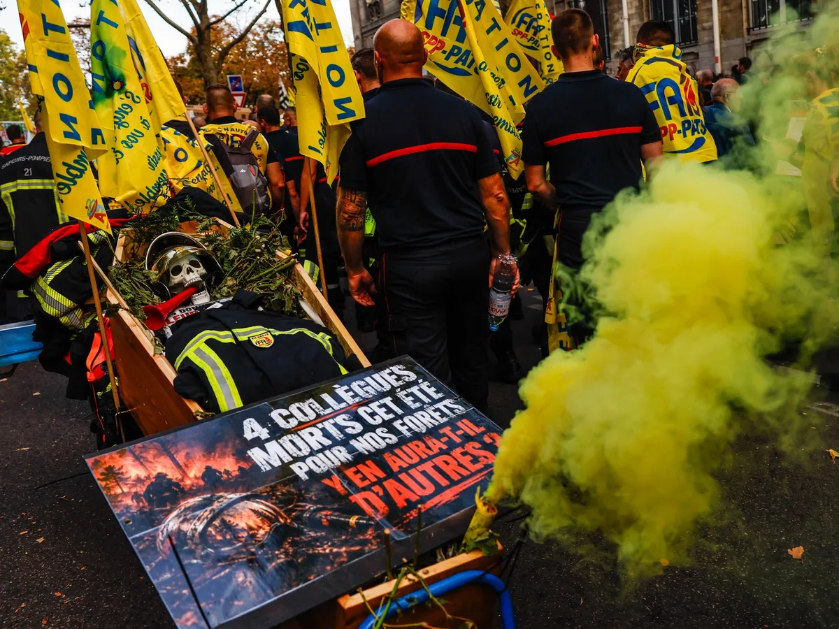 Public workers in France strike over pay as student protests turn violent