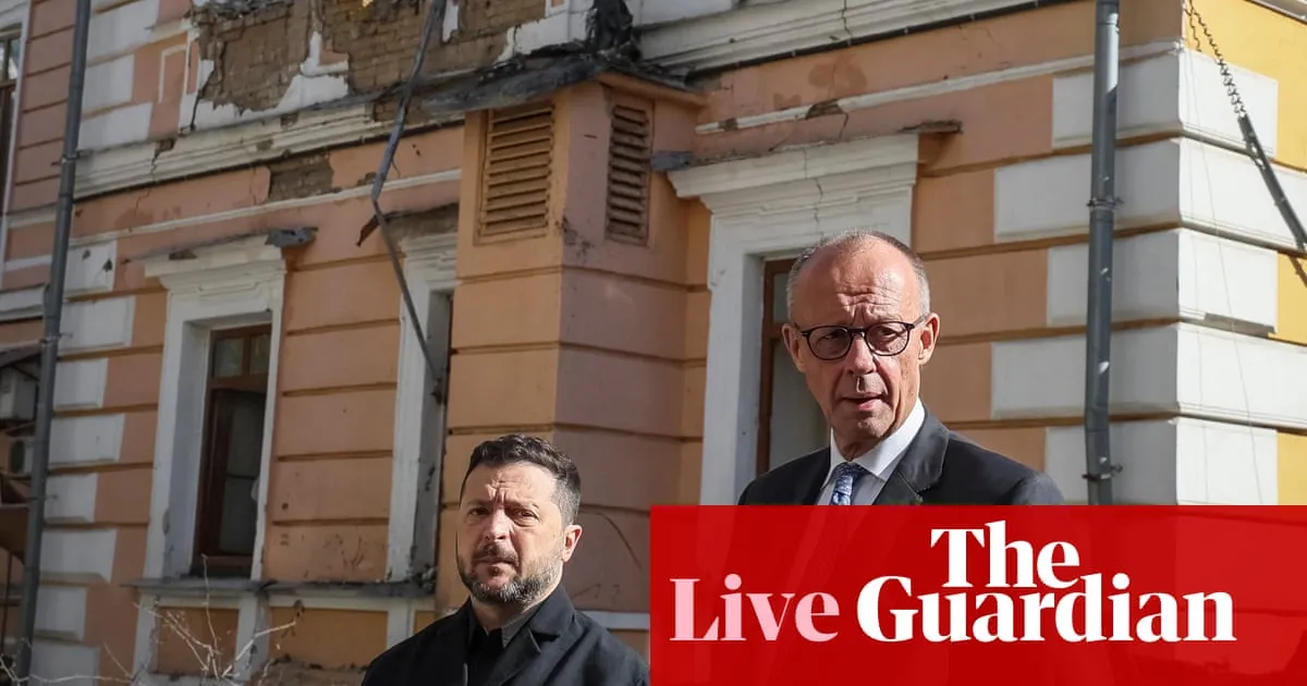 Friedrich Merz begins unannounced Kyiv visit as Russia continues strikes on Ukraine’s capital – Europe live