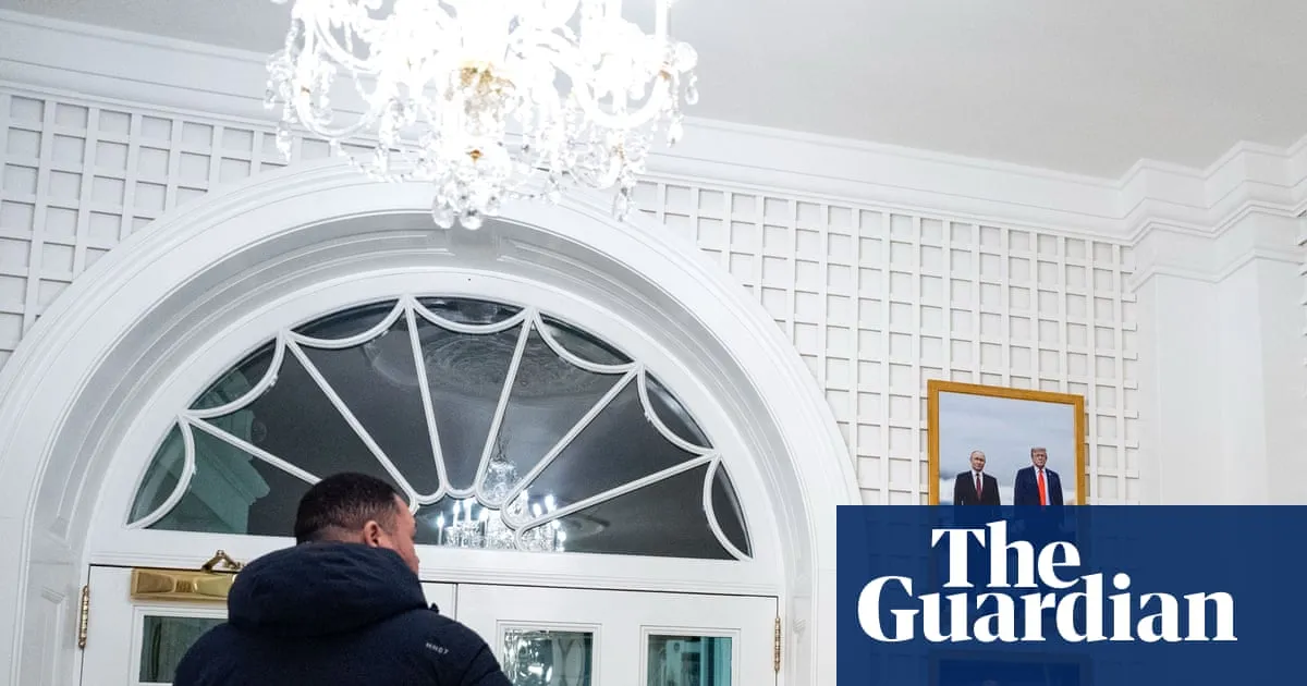 Critics aghast as White House displays framed photo of Trump with Putin
