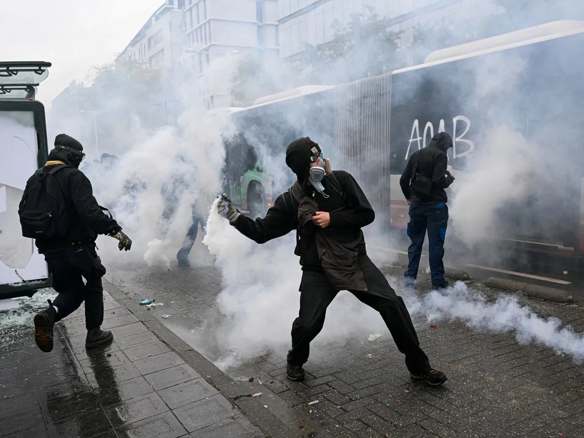Thousands rally for anti-austerity protest in Brussels amid clashes