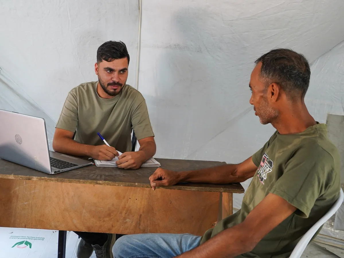 When streets become a workplace: Gaza workers convert tents into offices