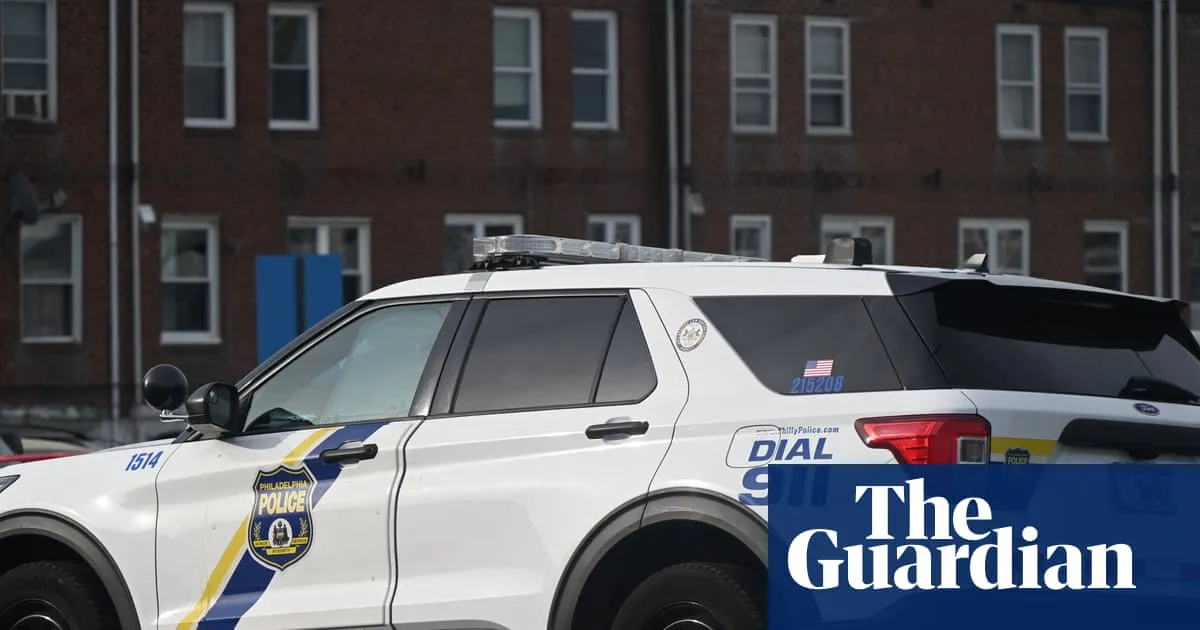 Man with gun kills one Philadelphia police officer and injures another