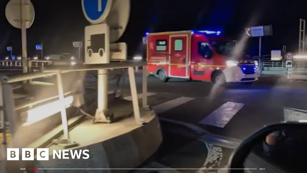 Bus hits train stopped on French side of Channel Tunnel, with 19 injured