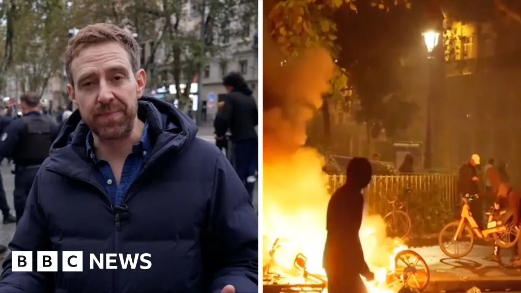 Clean up begins after French riots but police remain