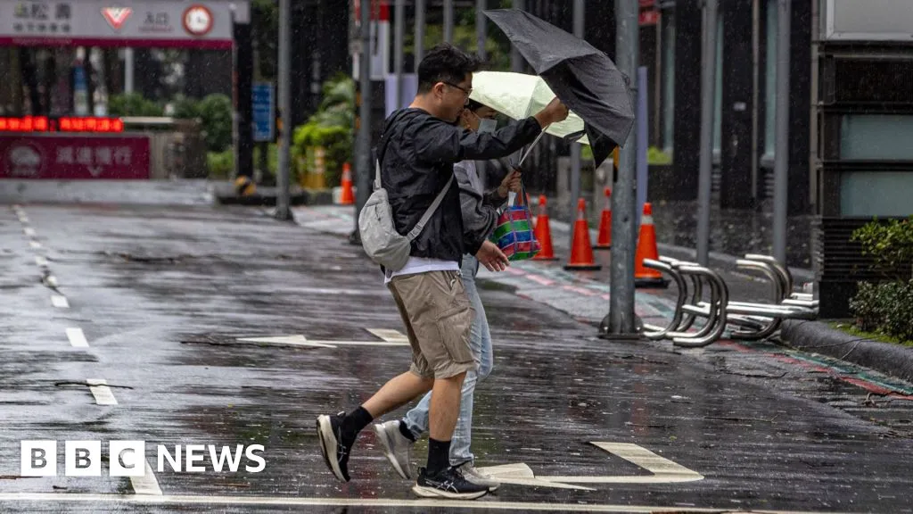 Hundreds of flights cancelled as Typhoon Champi shuts Taiwan