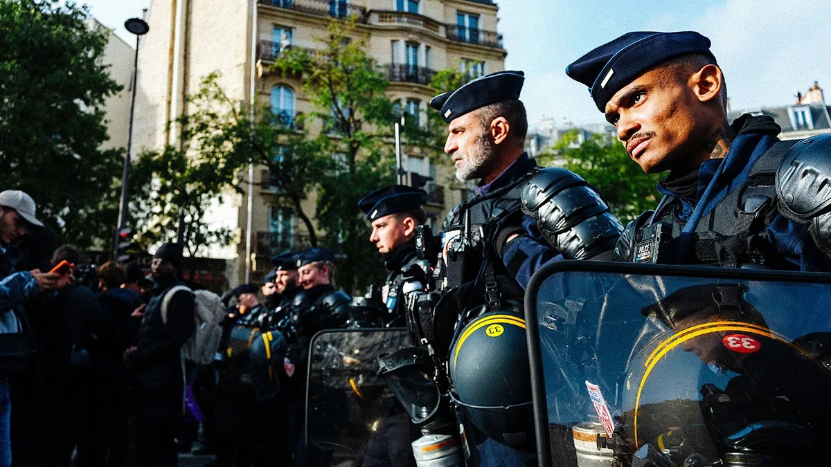 France on edge with 70,000 police deployed for unrest as authorities probe suspected terror attack near Paris