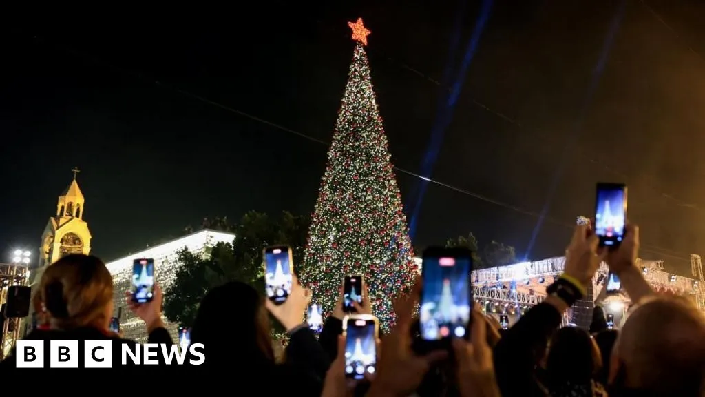 Bethlehem Christmas tree lights up for first time since start of Gaza war