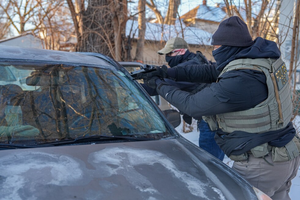 Immigration agents draw guns, arrest activists following them in Minneapolis
