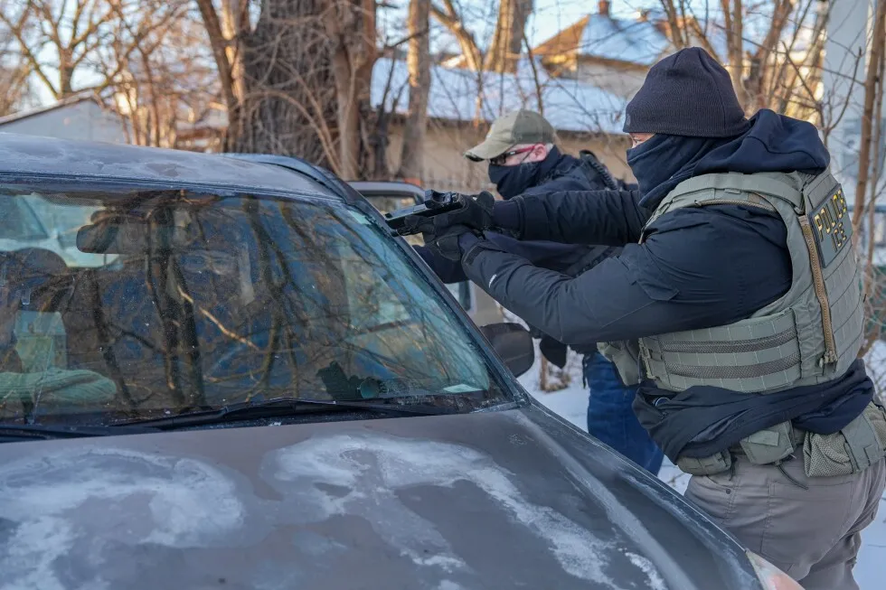 Immigration agents draw guns, arrest activists following them in Minneapolis