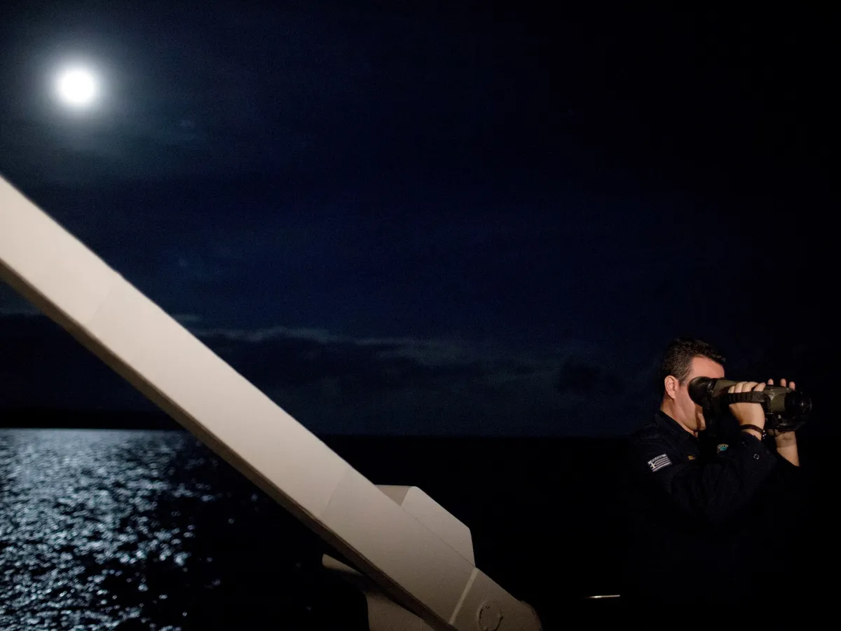 Collision between Greek coastguard vessel, migrant boat kills at least 14