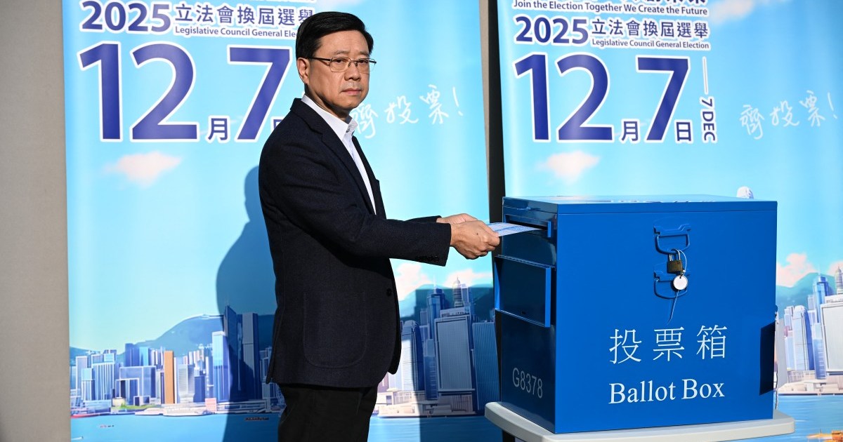 Hong Kong votes in ‘patriots only’ polls amid anger over deadly fire