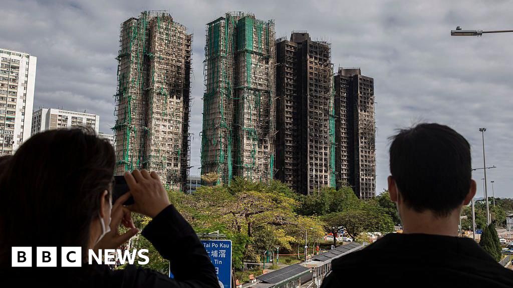 Hong Kong votes in election as city mourns deadly fire